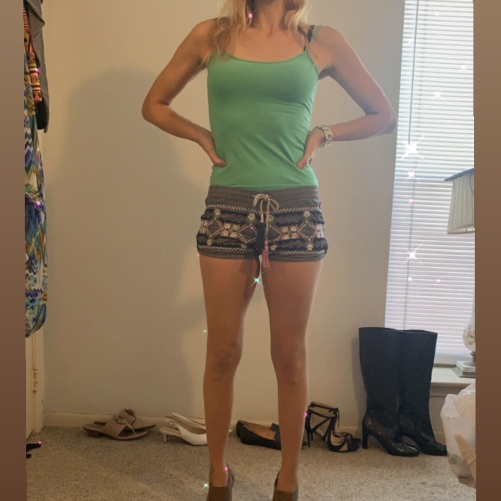 Embroidered shorts with tasseled drawstring